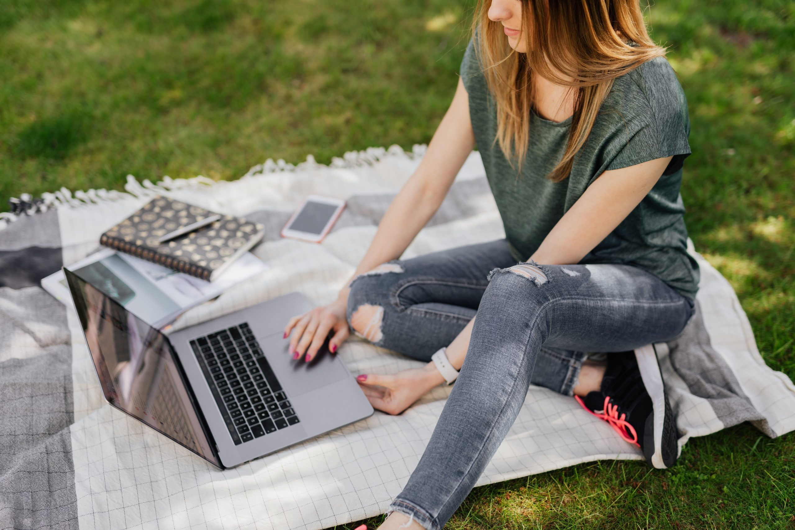 College student studying outside on campus