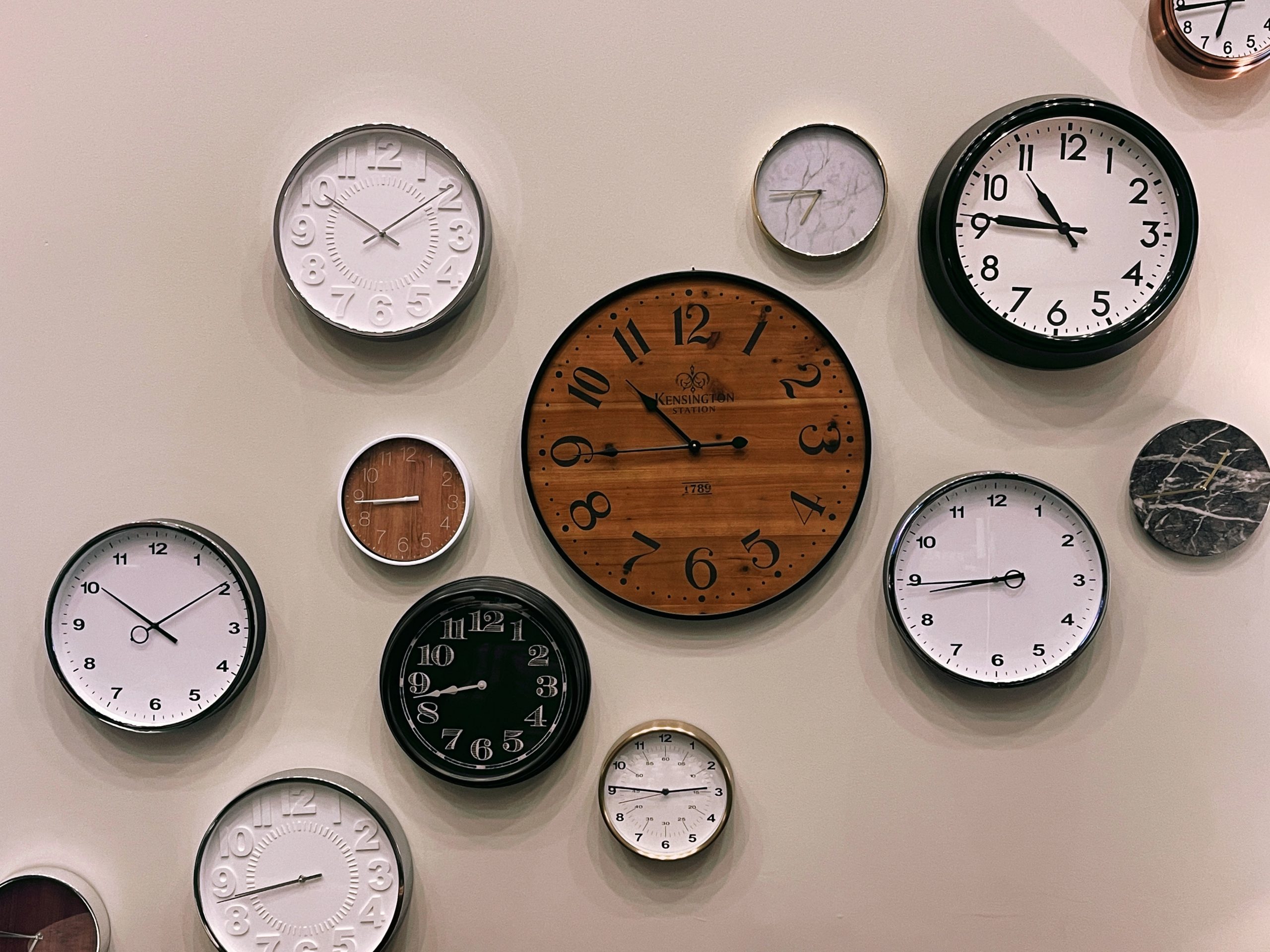 A variety of analog clocks